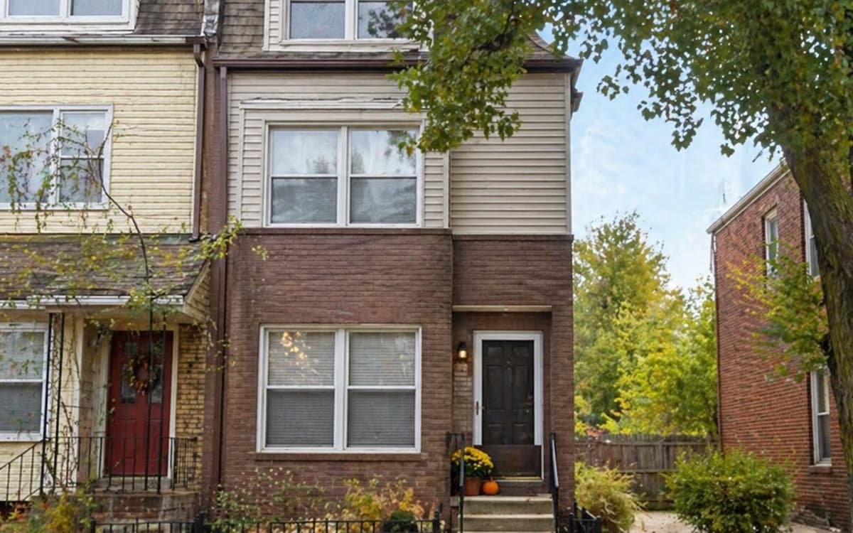 Brick row house in a Cleveland, Ohio neighborhood in autumn
